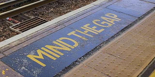 Photograph of MIND THE GAP at a UK railway station
